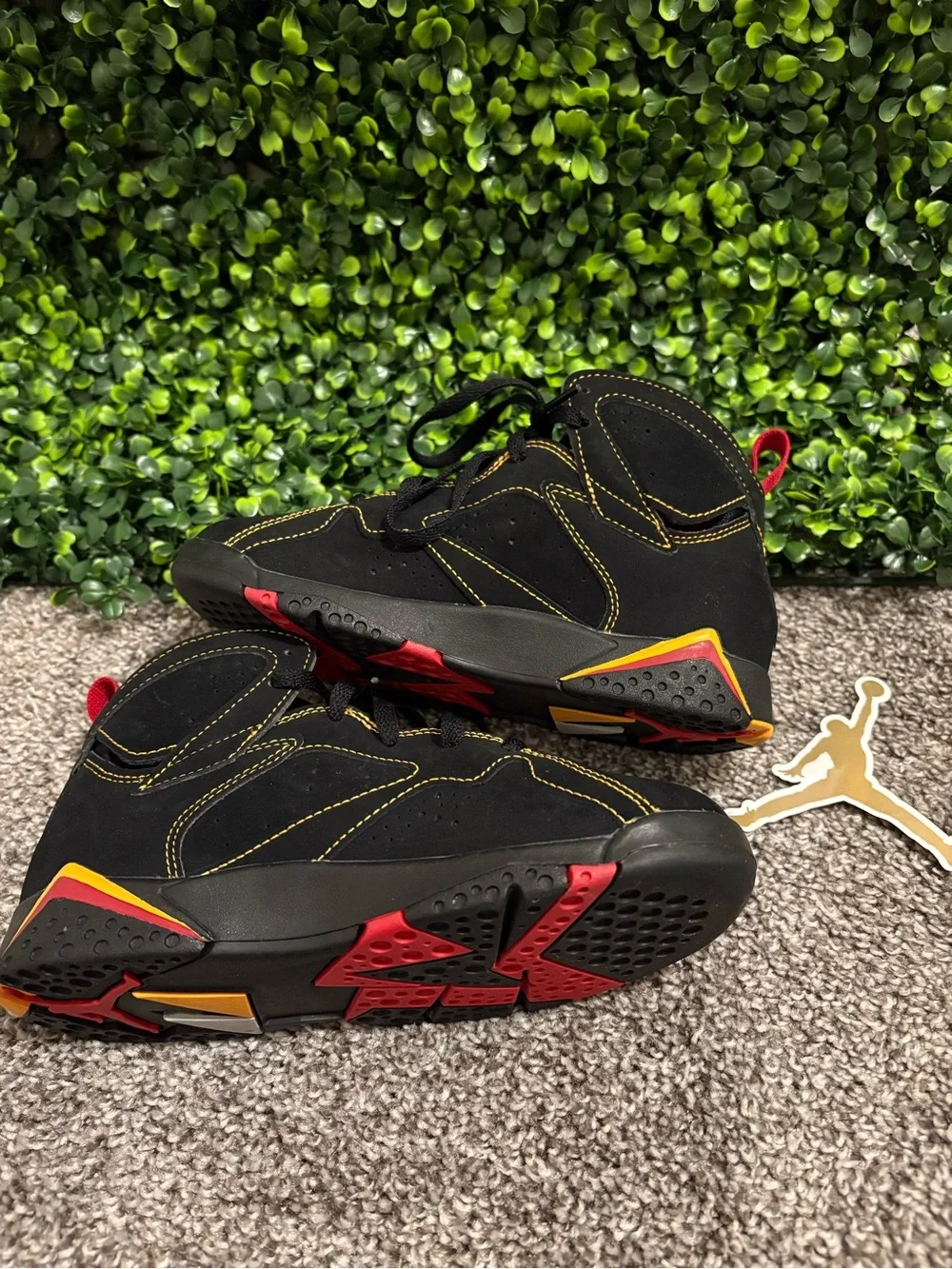 Jordan Kids Black Sneakers with Yellow & Red Accents